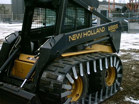 new holland skid steer with cat tracks|rebuildable skid steer tracks.